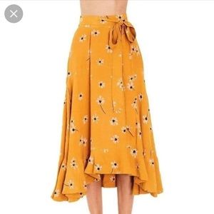 Faithfull the Brand: floral ruffle midi skirt, small